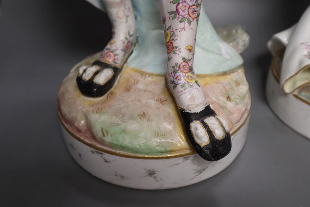 A pair of large 19th century Paris porcelain figures of a mandolin player and a woman dancer, printed anchor mark, 63.5cm